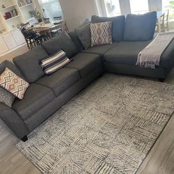 Couch with Pillows And Rug 
