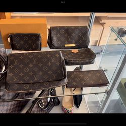 Authenticated Louis Vuitton Bags And Wallets