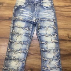 light blue washed stacked denim jeans 