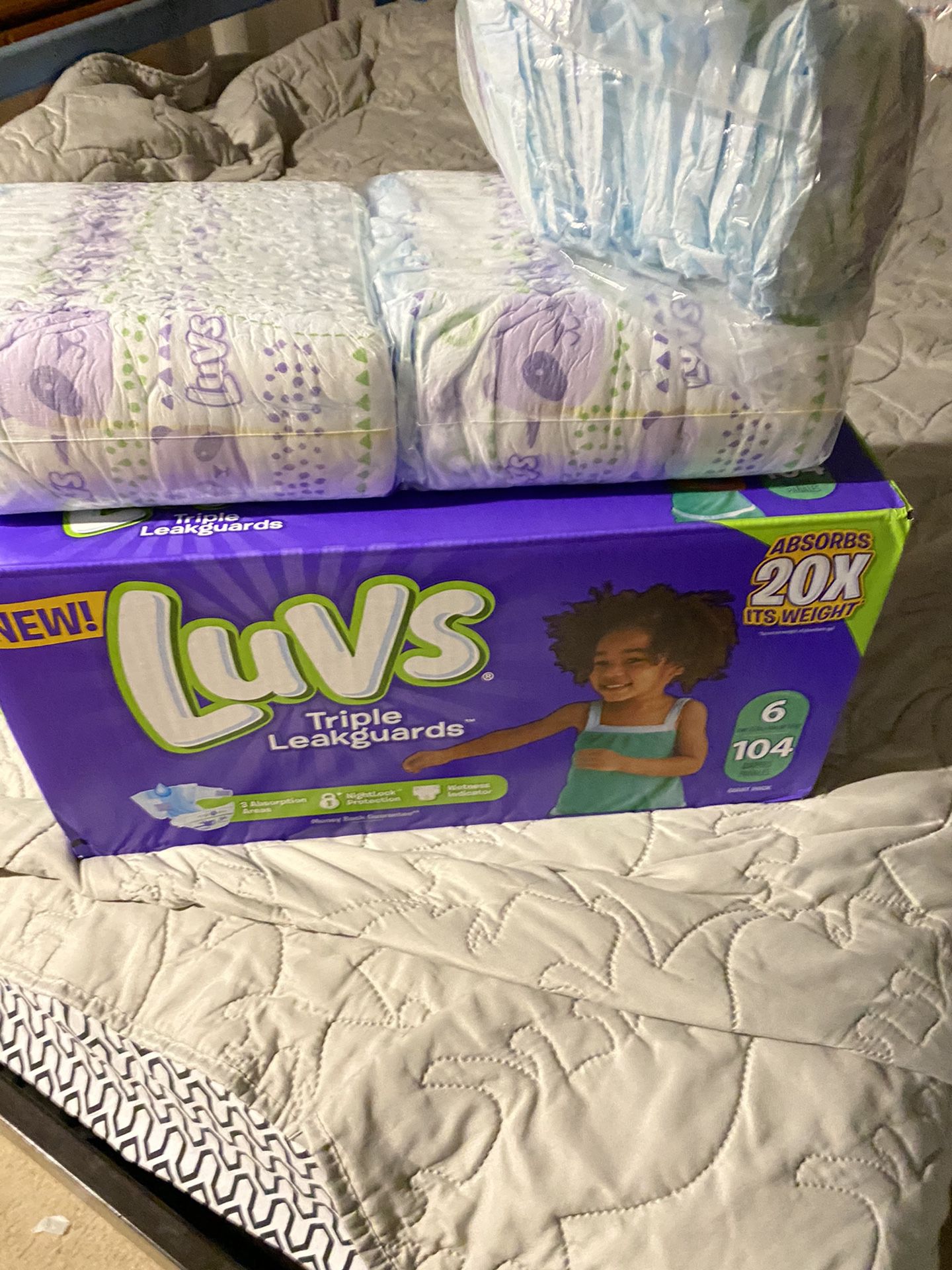 New box of luvs and 1package and half