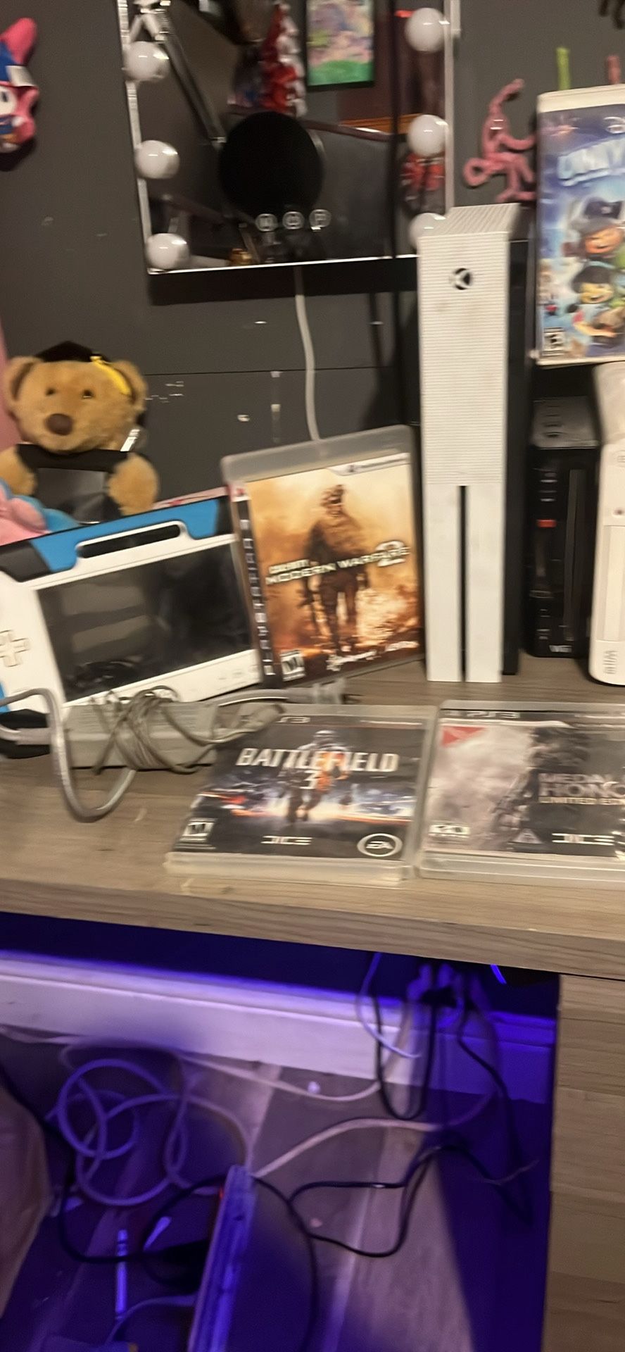 Wii and Wii u console with controller and games