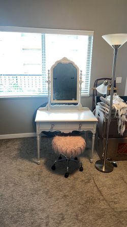 Vanity with mirror and stool