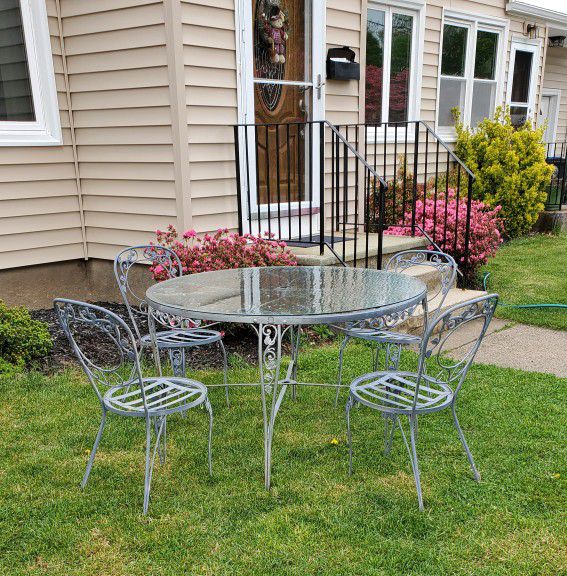Vintage Wrought Iron Patio Set With Glass Top table