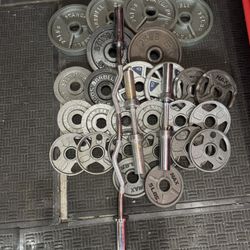Olympic weights 280lbs total plus curl bar and adjustable dumbbells handles