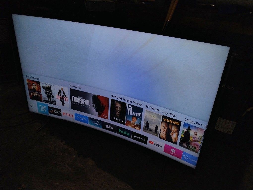 65-inch 4K UHD curved smart LED-LCD TV.