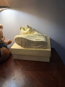 Air Jordan 4 Sneakers Butter Yellow