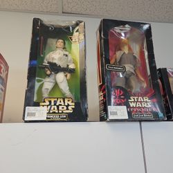 Various Barbie Dolls And Star Wars