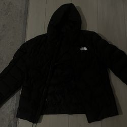 Stay warm in style this winter with this North Face Puffer Jacket.