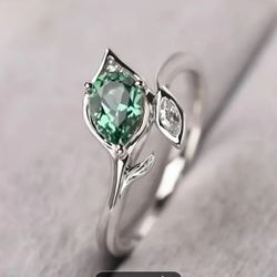 Pear Shaped Green Sapphire On Silver Band