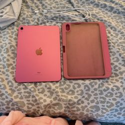 pink apple ipad 10th generation, case and charger. 