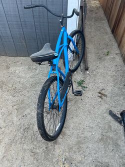Blue and black cruise bike