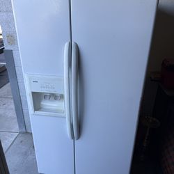 Kenmore side-by-side refrigerator and freezer