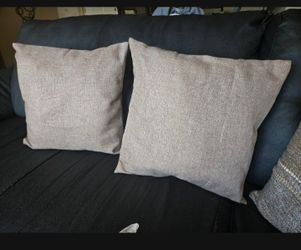 Two beige pillows