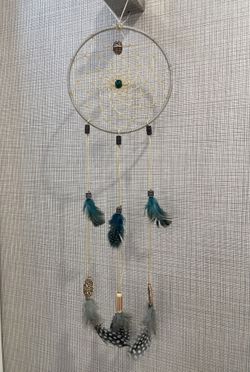 Beautiful Handcrafted dreamcatcher with feathers and beads
