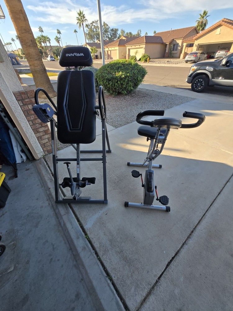 Inversion Table And Small Cycling Exercise Bike
