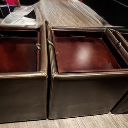 Three storage ottomans