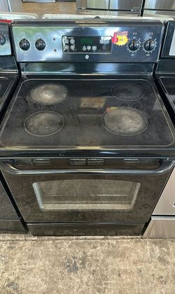 Black GE Electric Range with Glass Top