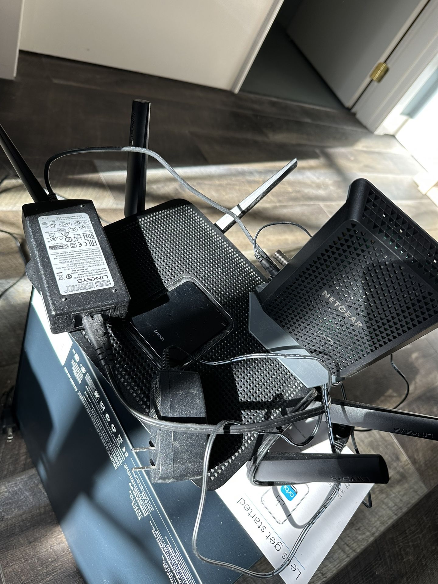 Linksys Router EA9300 And Netgear Modem CM700