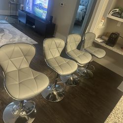 4 modern adjustable chairs  Complete Set 150 $