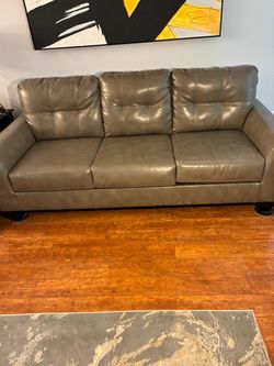 Neutral Tone Sofa, Recliner Chair and Framed Wall Picture