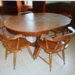 Vintage oak frame wood grain Formica top table with 4 captains chairs + leaf as shown in picture