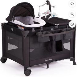Playpen, Bed, Changing Table All In One!
