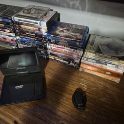Portable DVD Player With 30 Plus DVDs