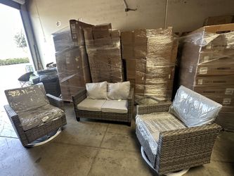 Two single sofas and one loveseat with a small table.