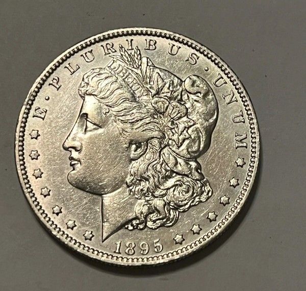 1895-o Morgan Silver dollar , solid XF / AU, scarce