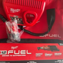 Milwaukee M12 Fuel Ratchet 2.0 Battery Charger And A Tool Bag