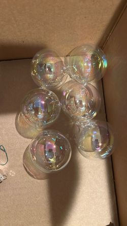Six clear glass blown ornaments