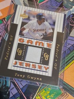 The 1997 Upper Deck Game Jerseys Tony Gwynn (#GJ2) is a pivotal piece of hobby history. It represents the dawn of the modern "relic card" era