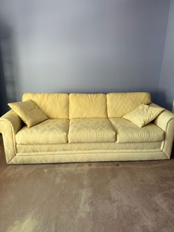 The Legendary “Holiday-Only” Cream Couch of Mystery