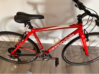 Cannon racing triathlon bicycle.  Mint condition. Many high end racing features.  New rims, tires, Absolutely perfect.  47 cm frame.  Racing gear.