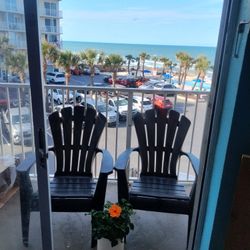 2- Black Plastic Adirondack Chairs $20 Pair