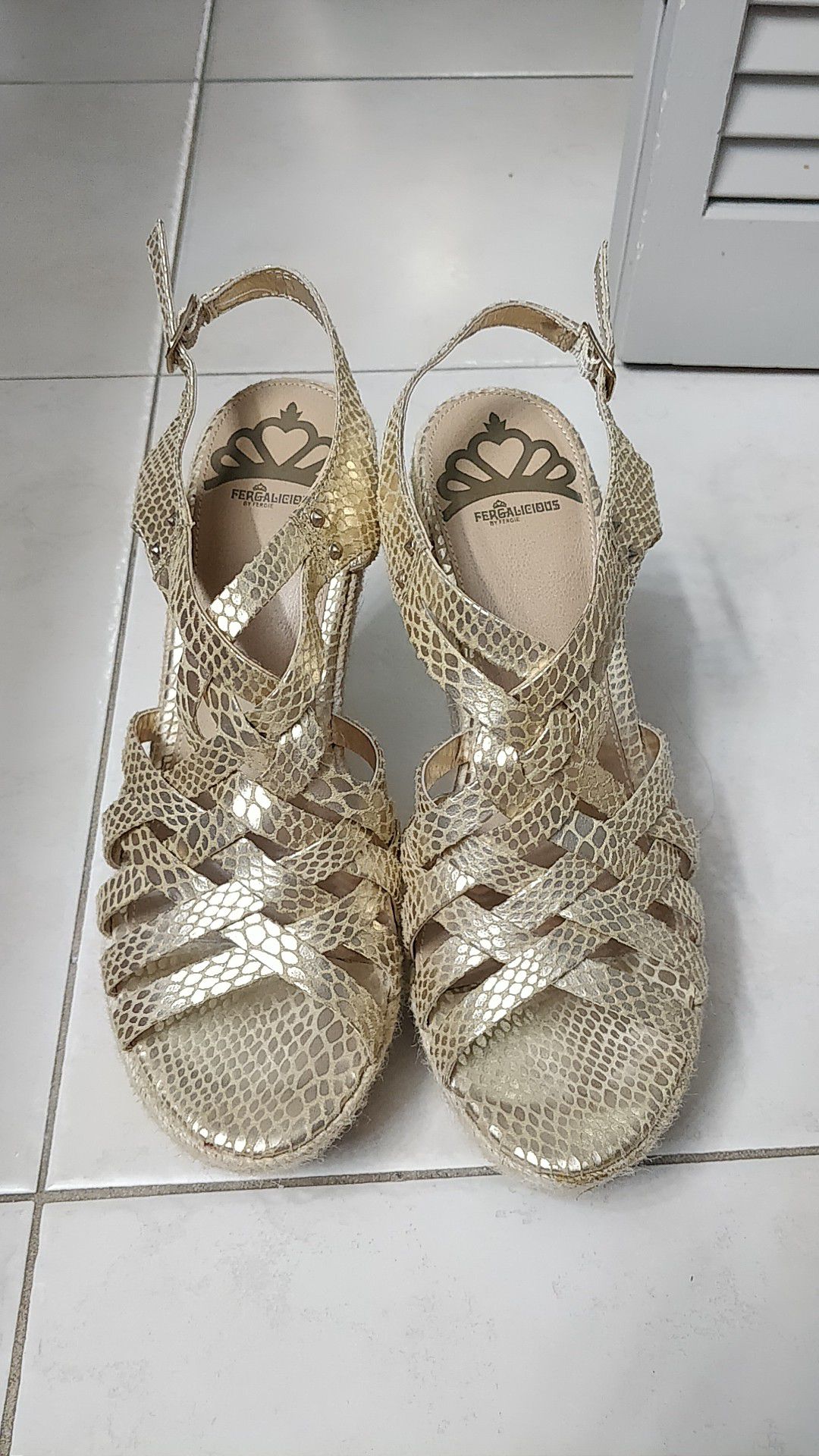 Gold sandals by Fergalicious
