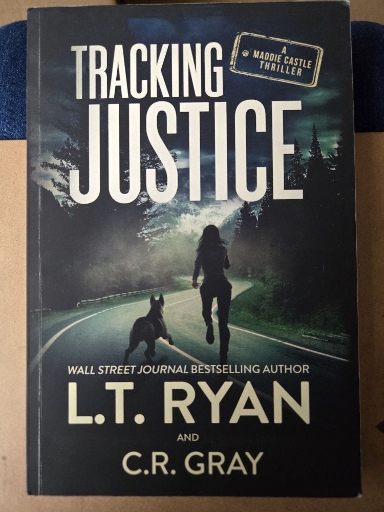 L. T. Ryan - Tracking Justice & The Handler