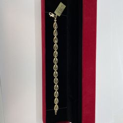 14K GOLD BRACELET. NEW. 