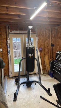 Punching bag including stand
