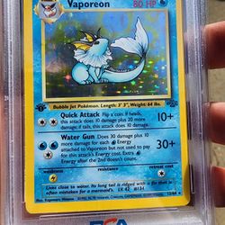 1st Edition Vaporeon PSA 8!