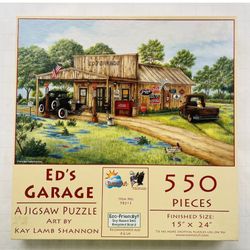 SunsOut 550 pc puzzle - Ed's Garage (Art by Kay Lamb Shannon) NO MISSING PIECES.
