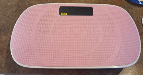 Pink Merach Vibration Plate with Remote.