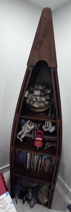 Wooden Canoe-Shaped Bookshelf