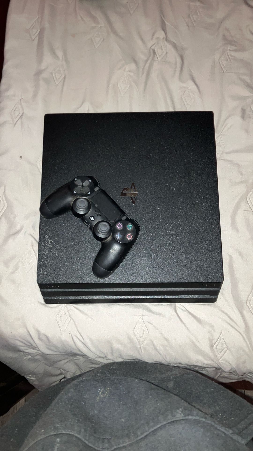 playstation  4 pro and  2 controllers
