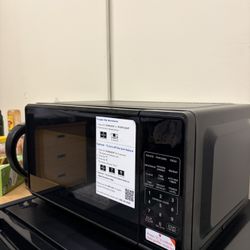 Mainstays 0.7 Cu ft Countertop Microwave Oven