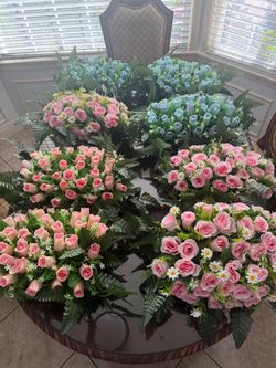 Eight bouquets of artificial flowers for special occasions or for home decoration