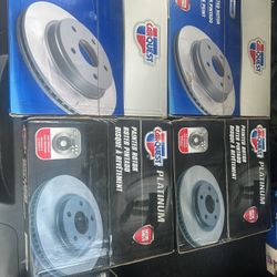 Brand New Full Brake Pad & Rotor Set With Spark Plugs