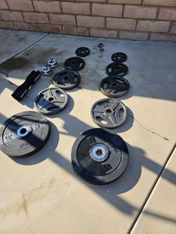 Squat rack, pull up bar, Olympic bar and weights