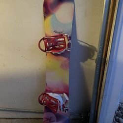 148cm Rossignol Tesla Snowboard And Women’s Size 7 RIDE Donna Boots