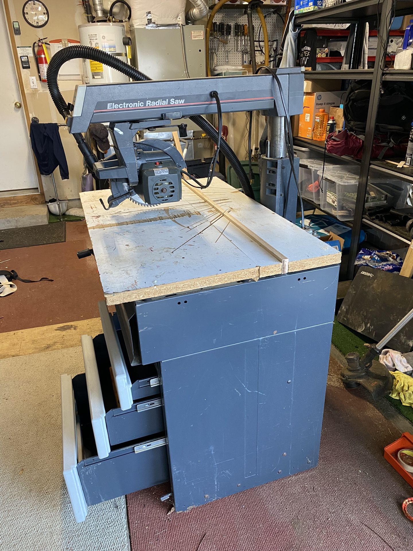 Radial Saw And Cabinet